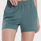 Millennia Elastic Waist Active Shorts in green, featuring a comfortable stretch and sleek design for active wear.