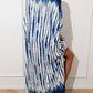 Woman wearing blue and white slit tie-dye half sleeve cover up made of 100% cotton, showcasing basic style and slightly stretchy fabric.