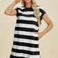 Woman wearing Basic Bae Full Size Striped Round Neck Cap Sleeve Mini Dress, black and white stripes, standing and smiling