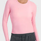 Millennia Round Neck Long Sleeve Sports Top in pink, showcasing a stylish and breathable design for workouts and lounging.