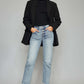 High Waist Button Fly Raw Hem Cropped Straight Jeans styled with a black top and blazer, featuring a chic and trendy vintage-inspired look.