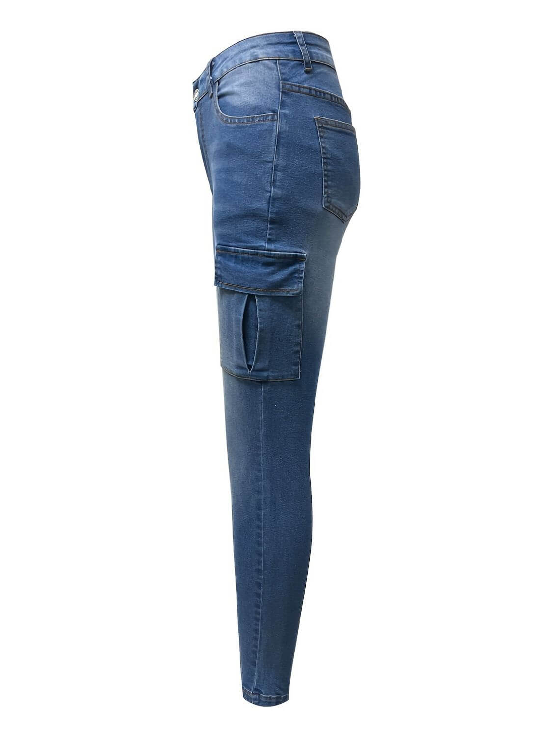 Side view of Bella Road Denim Skinny Jeans in medium wash, featuring pockets and a sleek design for a stylish look.