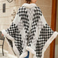 Cozy Bella Road Fuzzy Checkered Long Sleeve Poncho with stylish fur trim, perfect for fall layering and warmth.