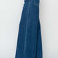 High rise palazzo jeans by Risen Jeans with wide-legged silhouette, high-waisted fit, and elegant denim for a flattering look