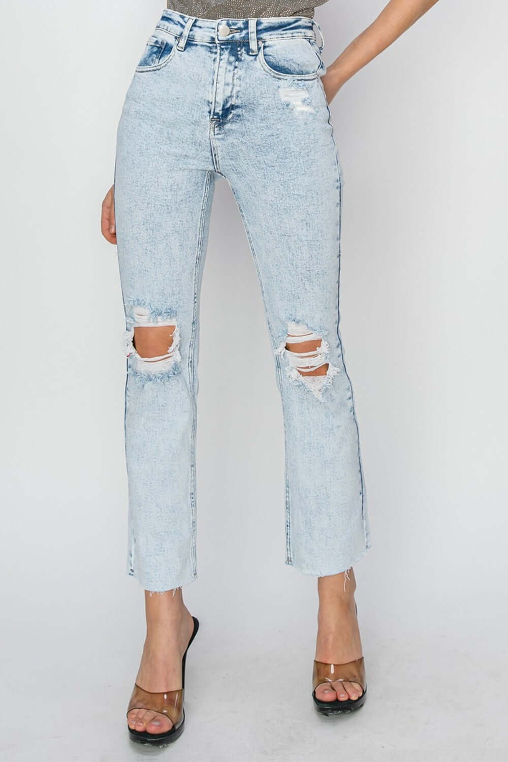 High Rise Distressed Ankle Jeans by Risen Jeans. Trendy distressed detailing, flattering high waist, versatile ankle length. Perfect for any occasion.