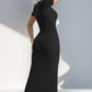 Woman wearing Basic Bae Built-In Shapewear Square Neck Short Sleeve Maxi Dress in black, showcasing the back design and fit.