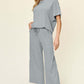 DOUBLE TAKE Full Size Texture Round Neck Short Sleeve T-Shirt and Wide Leg Pants at Bella Road