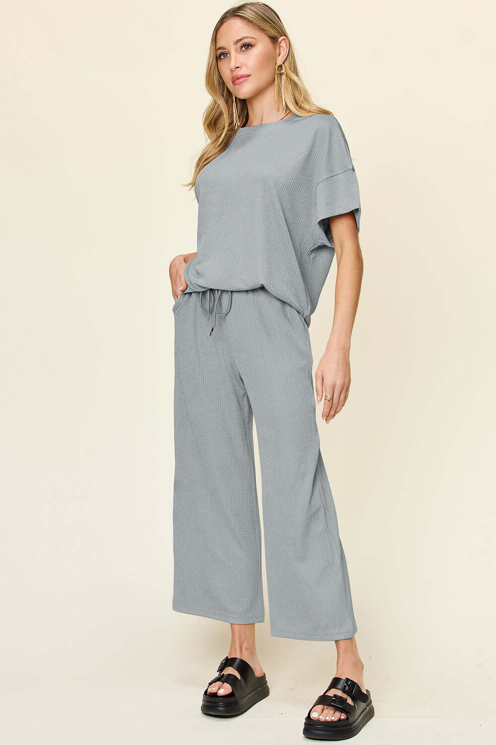 DOUBLE TAKE Full Size Texture Round Neck Short Sleeve T-Shirt and Wide Leg Pants at Bella Road