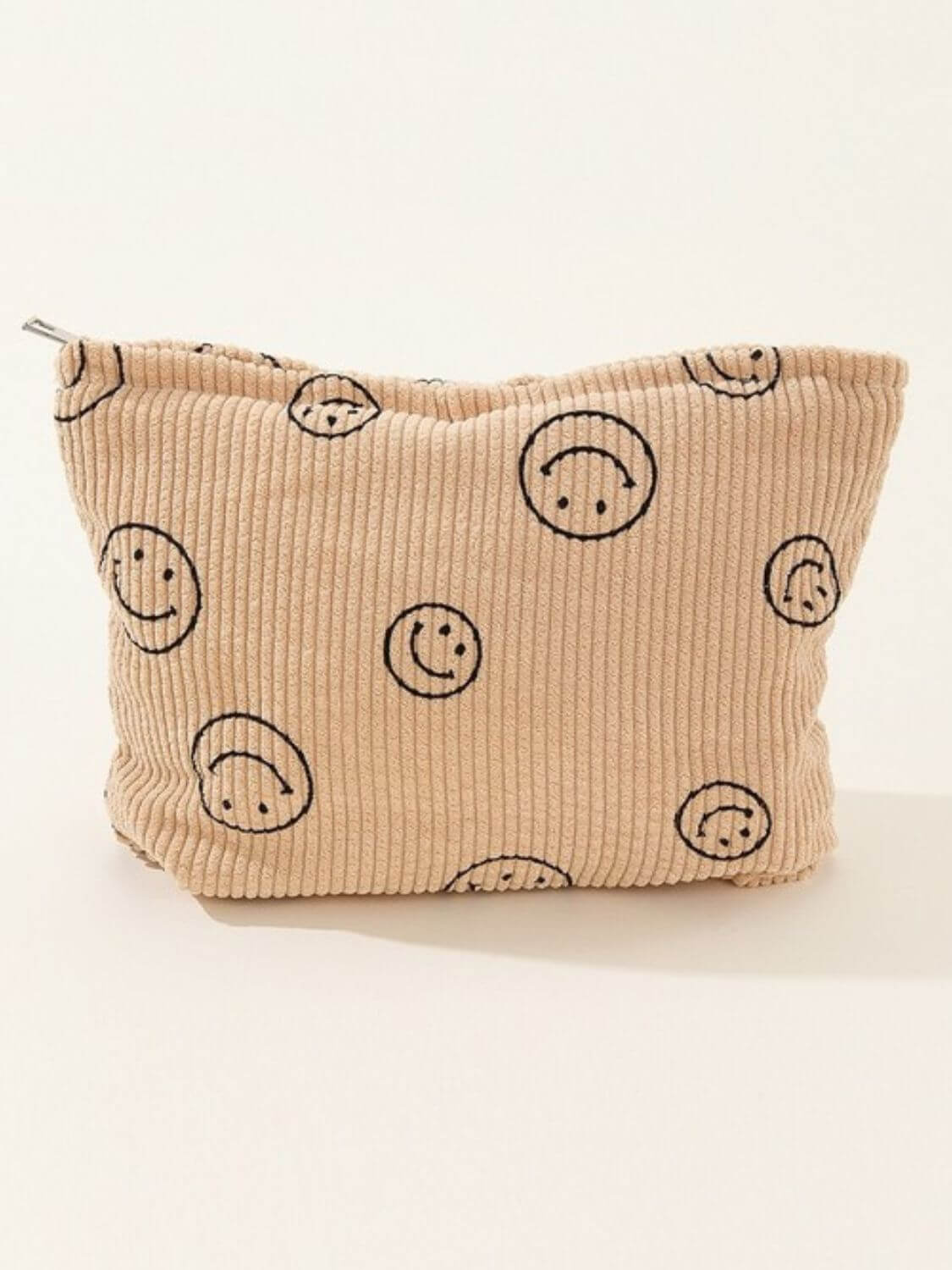 Zenana Corduroy Smile Clutch Bag featuring a cute smiley face print on a pinstripe design, perfect for casual or semi-formal settings.