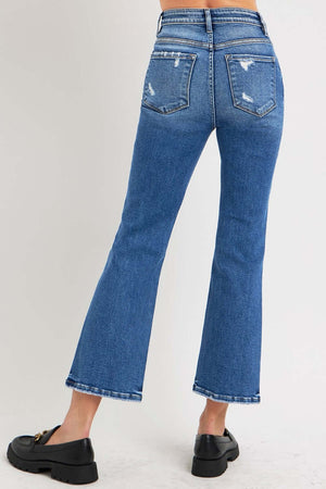 Back view of RISEN Full Size Tummy Control High Rise Crop Bootcut Jeans in blue with subtle distressed detailing and pocket accents