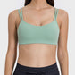 Stylish mint green active cami with double straps, perfect for workouts or casual wear, showcasing a playful design.