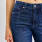 Close-up of Judy Blue full size tummy control straight jeans in dark blue with a flattering fit.