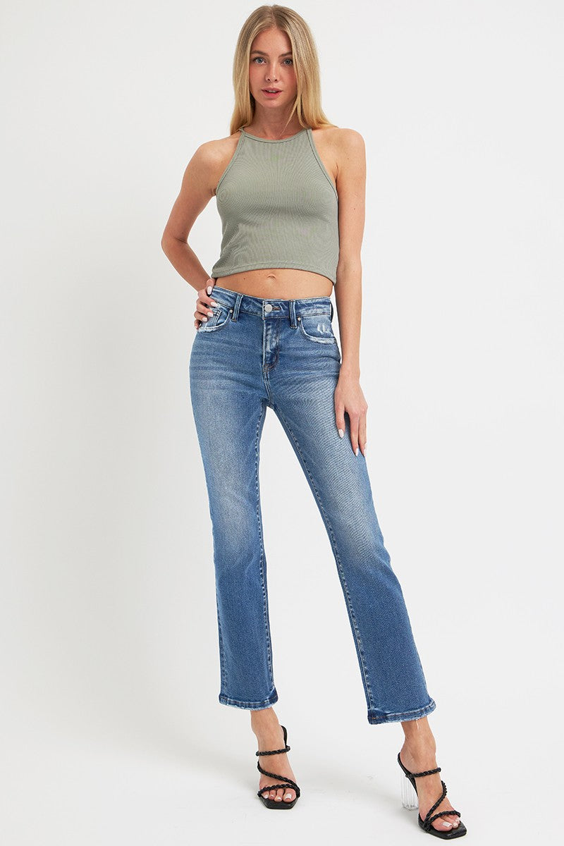 Woman wearing RISEN full size mid rise ankle straight jeans with pockets, stylish denim with a chic and versatile look