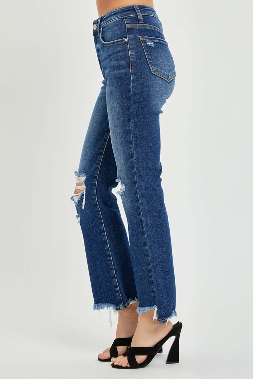 High Rise Distressed Crop Flare Jeans by Risen - Trendy women's denim with high rise fit, distressed detailing, and cropped flare silhouette