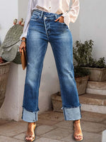 Stepped Waist Raw Hem Rolled Straight Jeans with buttoned fly and slightly stretchy fabric, accentuating curves and featuring edgy rolled cuffs