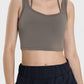 Stylish Millennia Crisscross Square Neck Active Tank in olive green, perfect for workouts and casual outings.