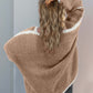 Woman wearing a Double Take Contrast Cardigan with open front and dropped shoulders, showcasing the relaxed back design.