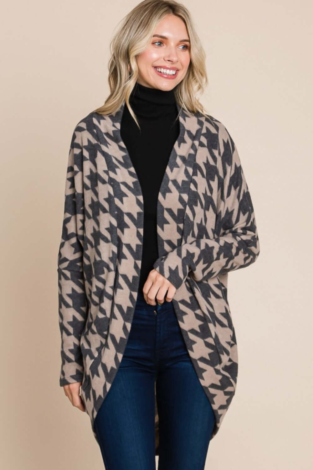 Woman wearing BOMBOM Houndstooth Open Front Cocoon Knit Cardigan with chic pattern for a stylish, versatile look.