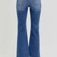 Back view of RISEN distressed high rise crop flare jeans with chic flare and pockets