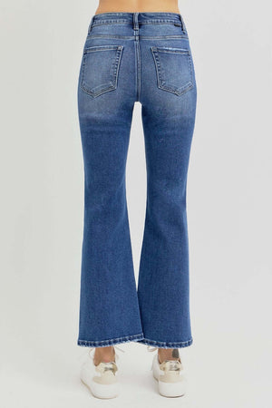 Back view of RISEN distressed high rise crop flare jeans with chic flare and pockets