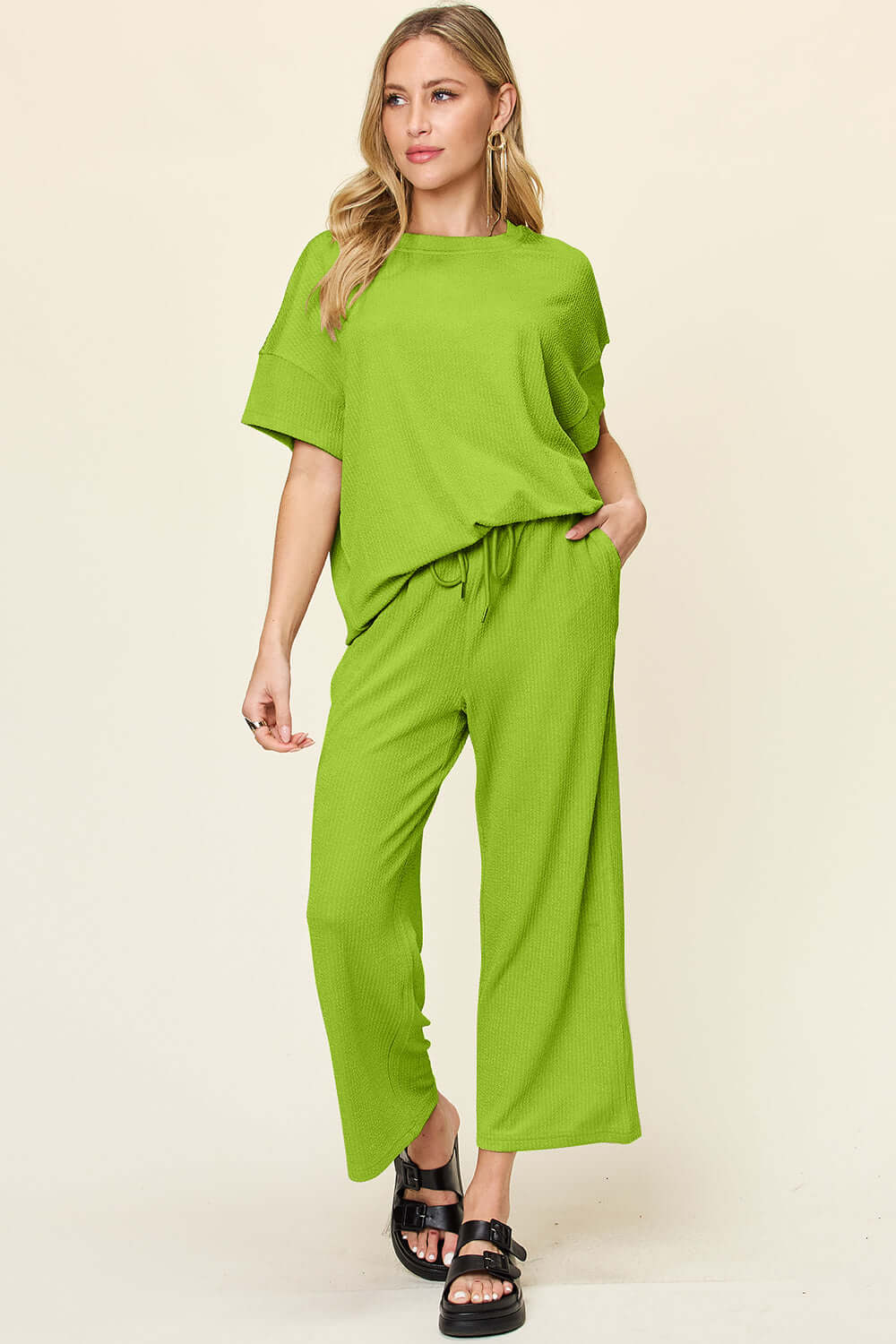 DOUBLE TAKE Full Size Texture Round Neck Short Sleeve T-Shirt and Wide Leg Pants at Bella Road