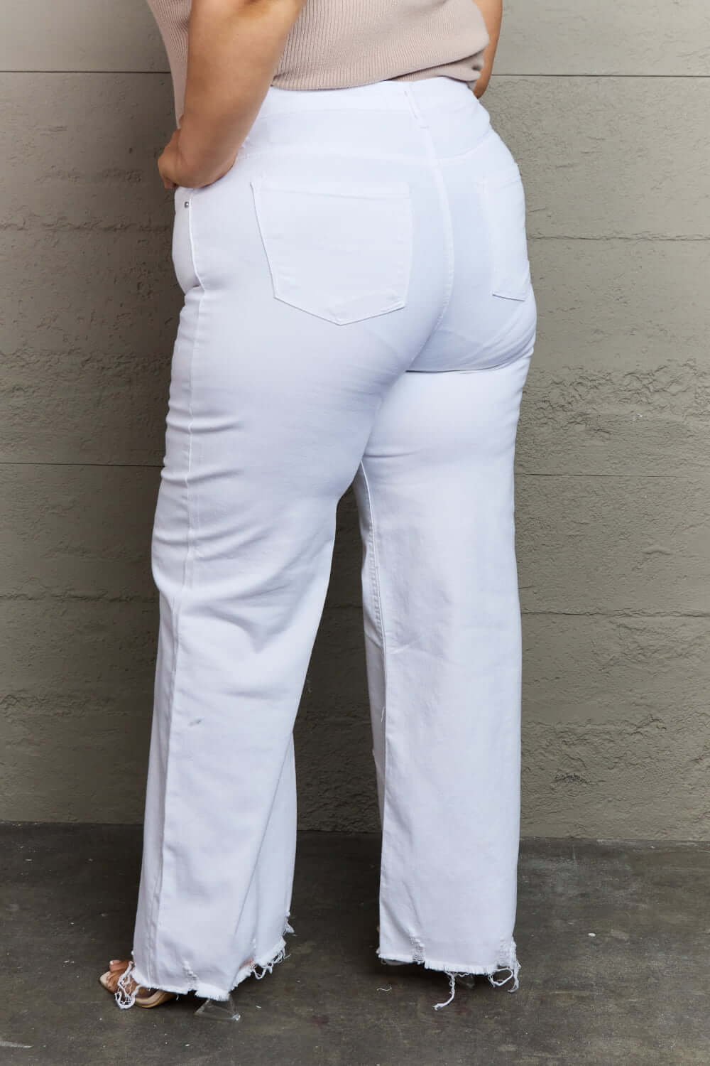 Raelene High Waist Wide Leg Jeans in White by Risen Jeans rear view showcasing the flattering fit and chic modern design.