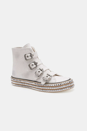 White multi-buckle platform sneakers with studded sole for a trendy, edgy look. Perfect for stylish outfits and all-day comfort.