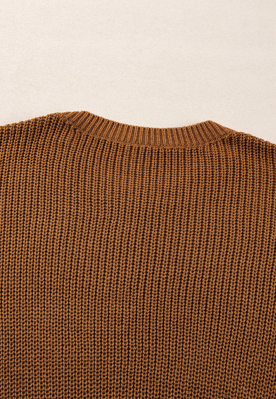 Close-up of Bella Road Pearl Detail Sweater in brown, showcasing the intricate knit texture and classic round neck.