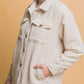 Woman wearing a Love Tree Corduroy Button Up Jacket with cozy sherpa lining in a stylish, relaxed fit.