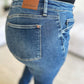 Close-up of High Waist Judy Blue Skinny Jeans back pocket and logo in stretchy denim fabric