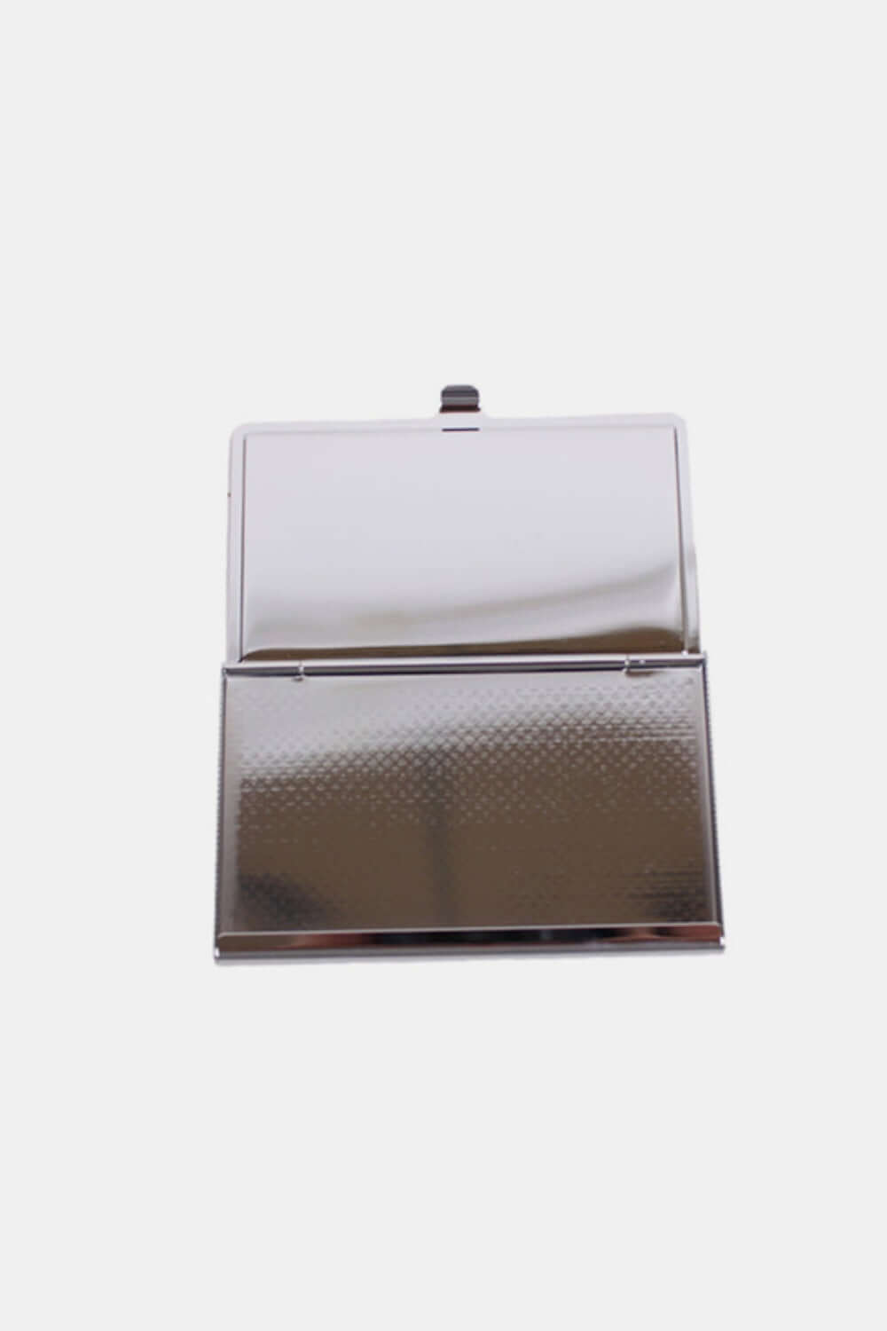 Open metallic business card case by Nicole Lee USA with a stainless steel back and snap closure.