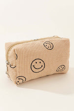 Cute Zenana Smiley Face Corduroy Cosmetic Pouch with embroidered smiley faces, perfect for organizing makeup essentials.