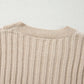 Close-up of Bella Road tan cable-knit sweater with round neck and color block design. Cozy, stylish, perfect for cool days.