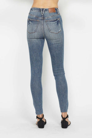 Rear view of model wearing Judy Blue Jeans Tummy Control Vintage Wash Hem Destroy Skinny Jeans