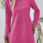 Bella Road textured pink mini dress with long sleeves and a round neck, perfect for casual outings.