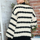 Woman wearing Bella Road Striped Contrast Open Front Long Sleeve Cardigan, cozy and stylish, perfect for layering.