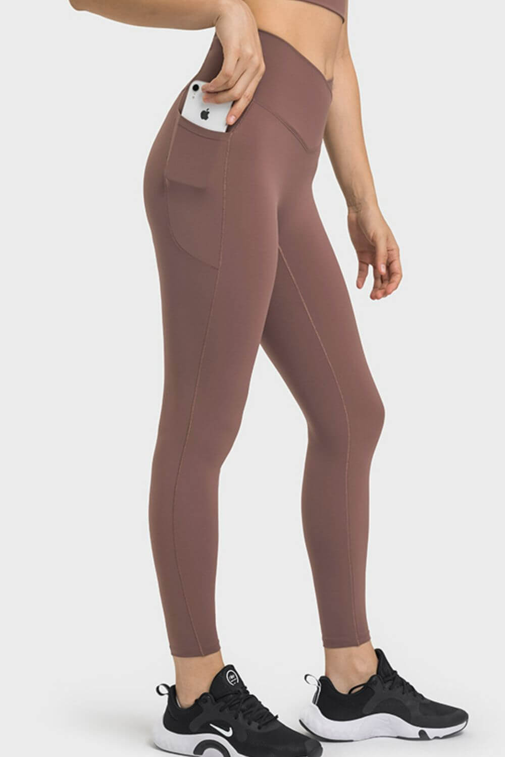 Millennia V-Waist Yoga Leggings in brown with pocket, perfect for workouts and everyday wear, featuring a stylish fit.