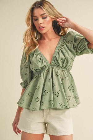 Chic Aemi + Co Eyelet Embroidered V-Neck Half Sleeve Peplum Blouse in green, perfect for stylish summer outfits.