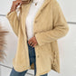 Cozy pastel yellow fuzzy hooded jacket with button-up design, perfect for chilly days.