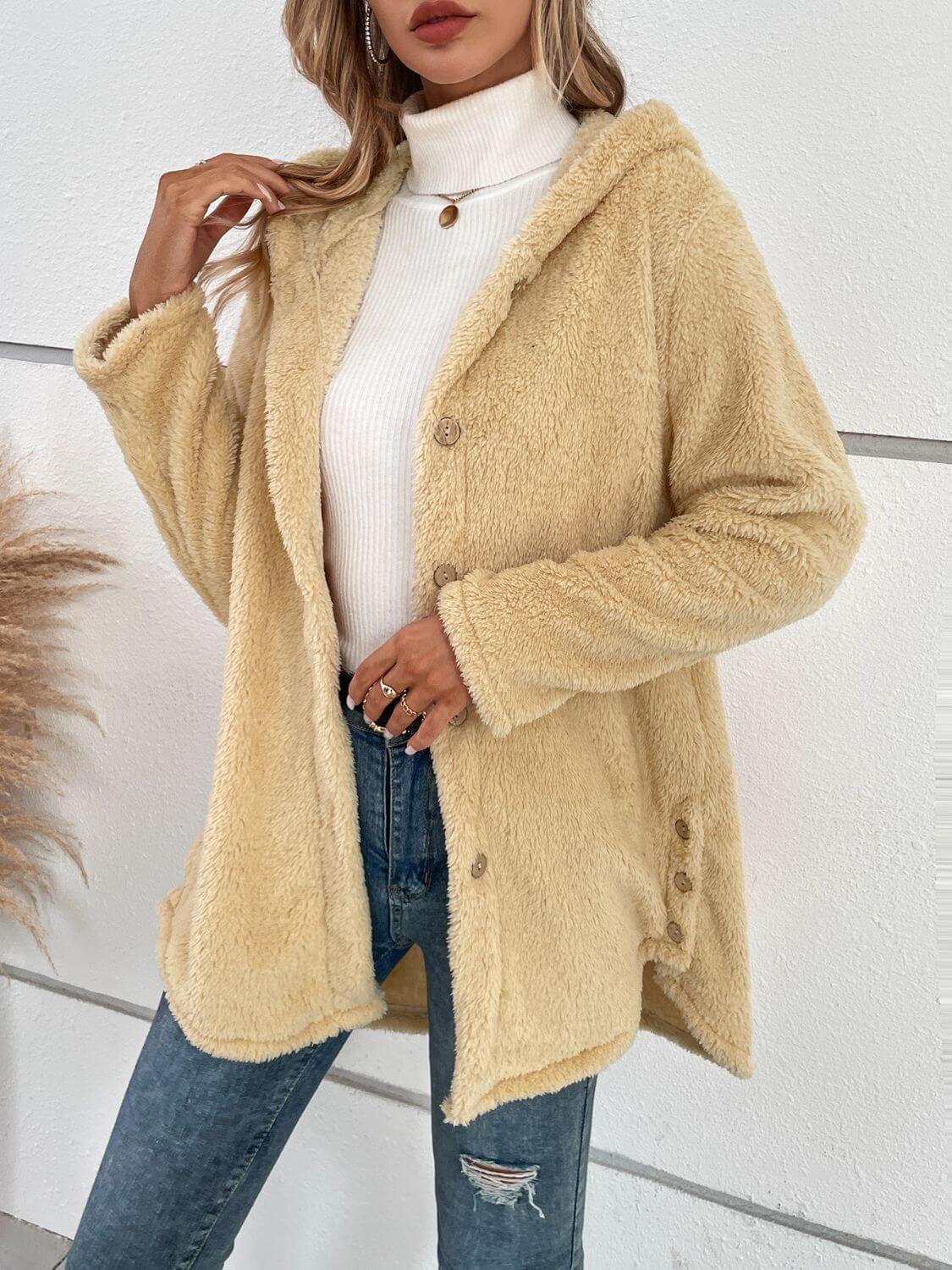 Cozy pastel yellow fuzzy hooded jacket with button-up design, perfect for chilly days.