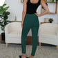 Woman wearing FAM-FAM High Waist Skinny Pants in green, showing back view. Stylish and versatile fashion choice for any outfit.