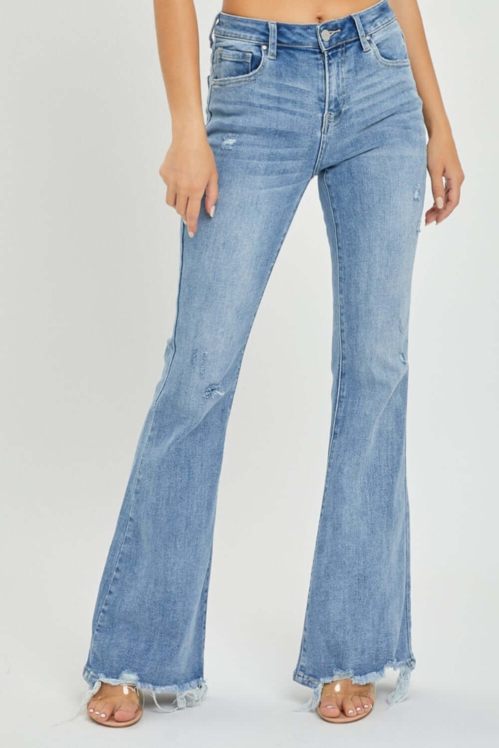 High Rise Frayed Hem Flare Jeans by Risen Jeans, front view showcasing trendy flare leg and frayed hem, perfect for a retro-inspired look.