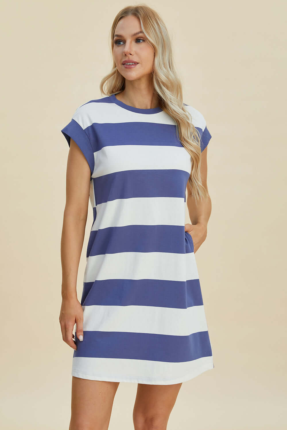 Woman wearing Basic Bae Full Size Striped Round Neck Cap Sleeve Mini Dress in blue and white, perfect for stylish and comfortable all-day wear