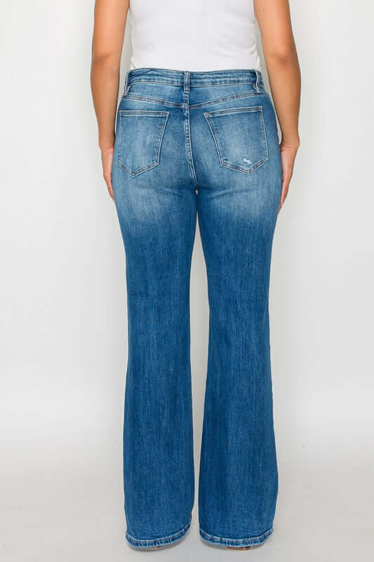 back view of bytos Full Size Distressed High Rise Jeans showcasing flared legs and pockets for a trendy look