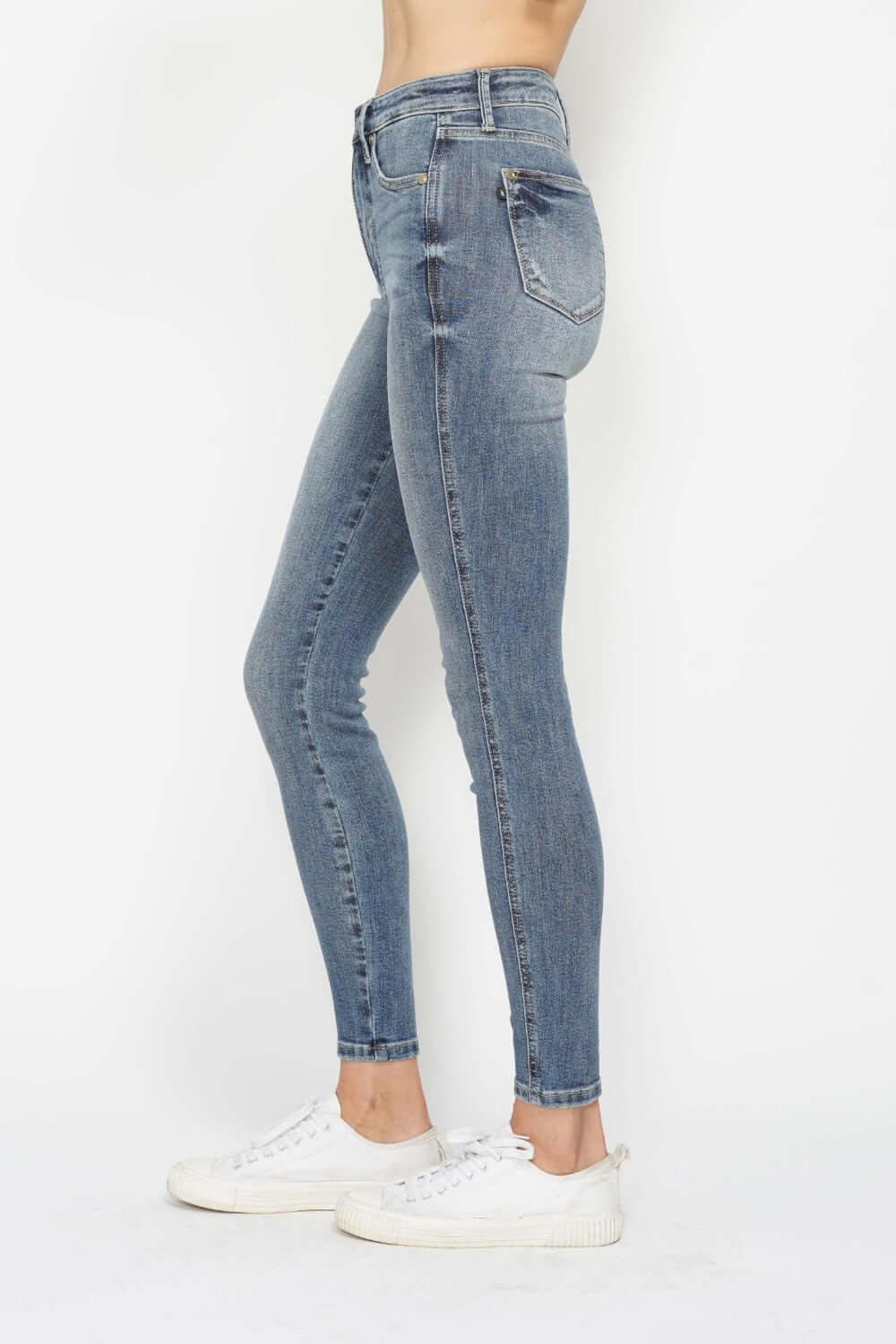 Judy Blue tummy control contrast wash skinny jeans showcasing sleek fit and stylish design for versatile wear