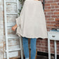 Cozy Bella Road Batwing Sleeve Sweater in stylish setting, perfect for a chic and warm look.