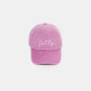 SALTY embroidered vintage washed pink baseball cap with a distressed look and retro charm, perfect for a casual, laid-back style.