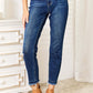 High Waist Released Hem Slit Jeans in deep indigo wash, flattering fit, worn with tan ankle boots - Judy Blue Jeans Style #88704