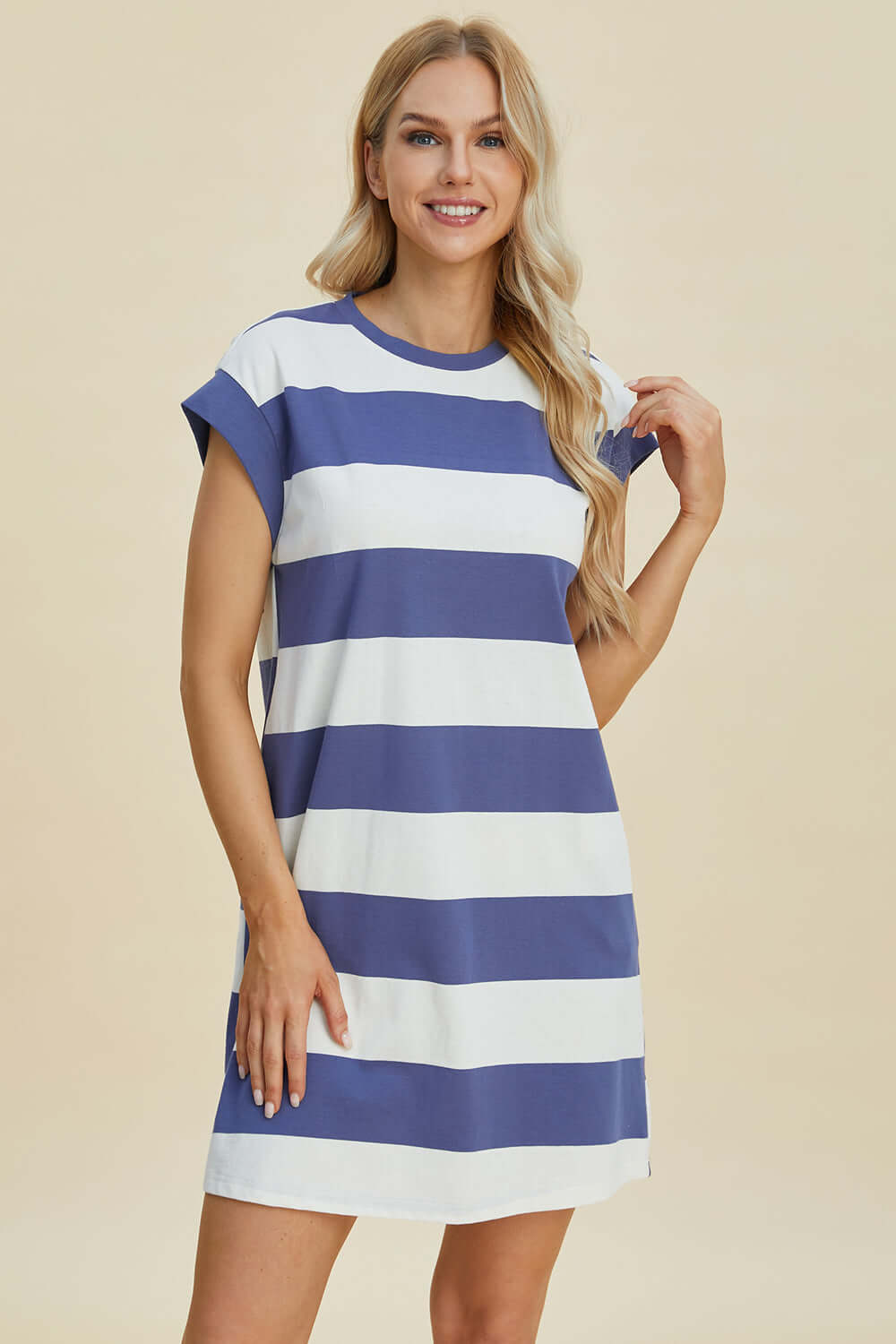 Woman wearing Basic Bae full-size striped round neck cap sleeve mini dress