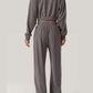 Back view of a gray Bella Road Crisscross Round Neck Top and Drawstring Pants Set made of 100% polyester